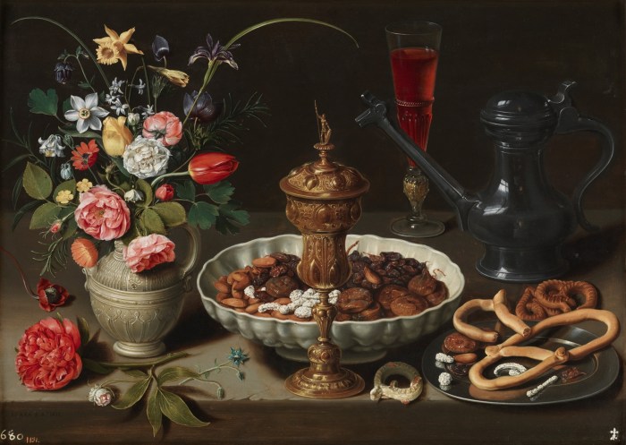 Still life with flowers goblet dried fruit and pretzels